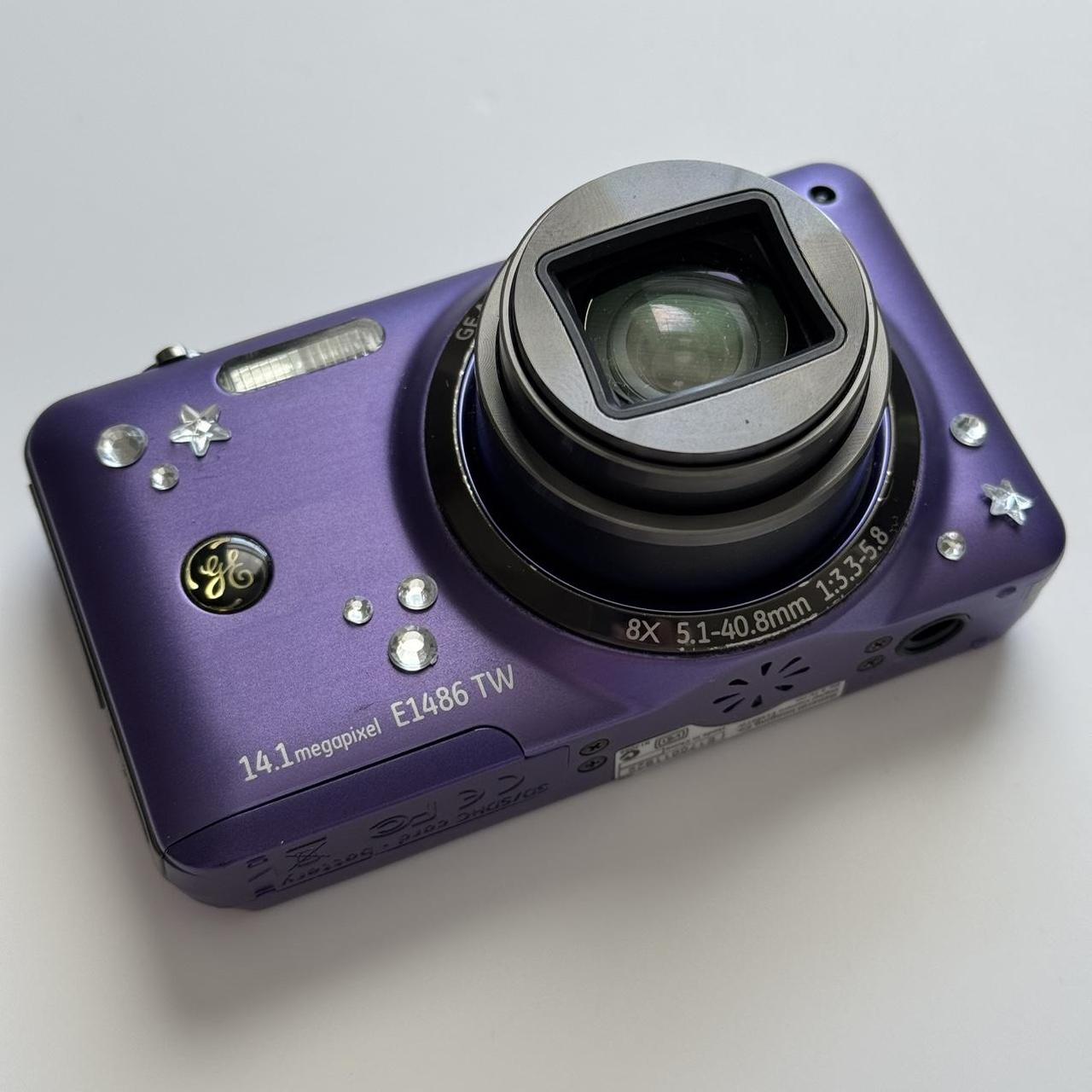 Used E1486TW Purple Digital Camera