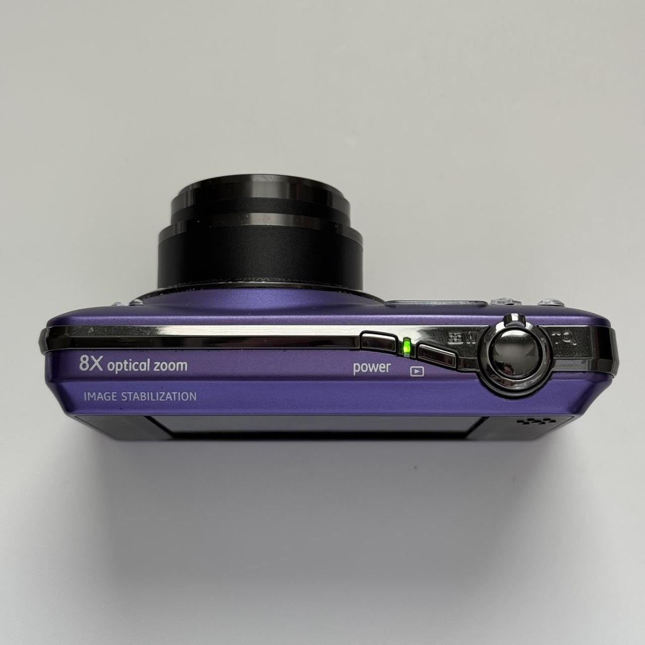Used E1486TW Purple Digital Camera