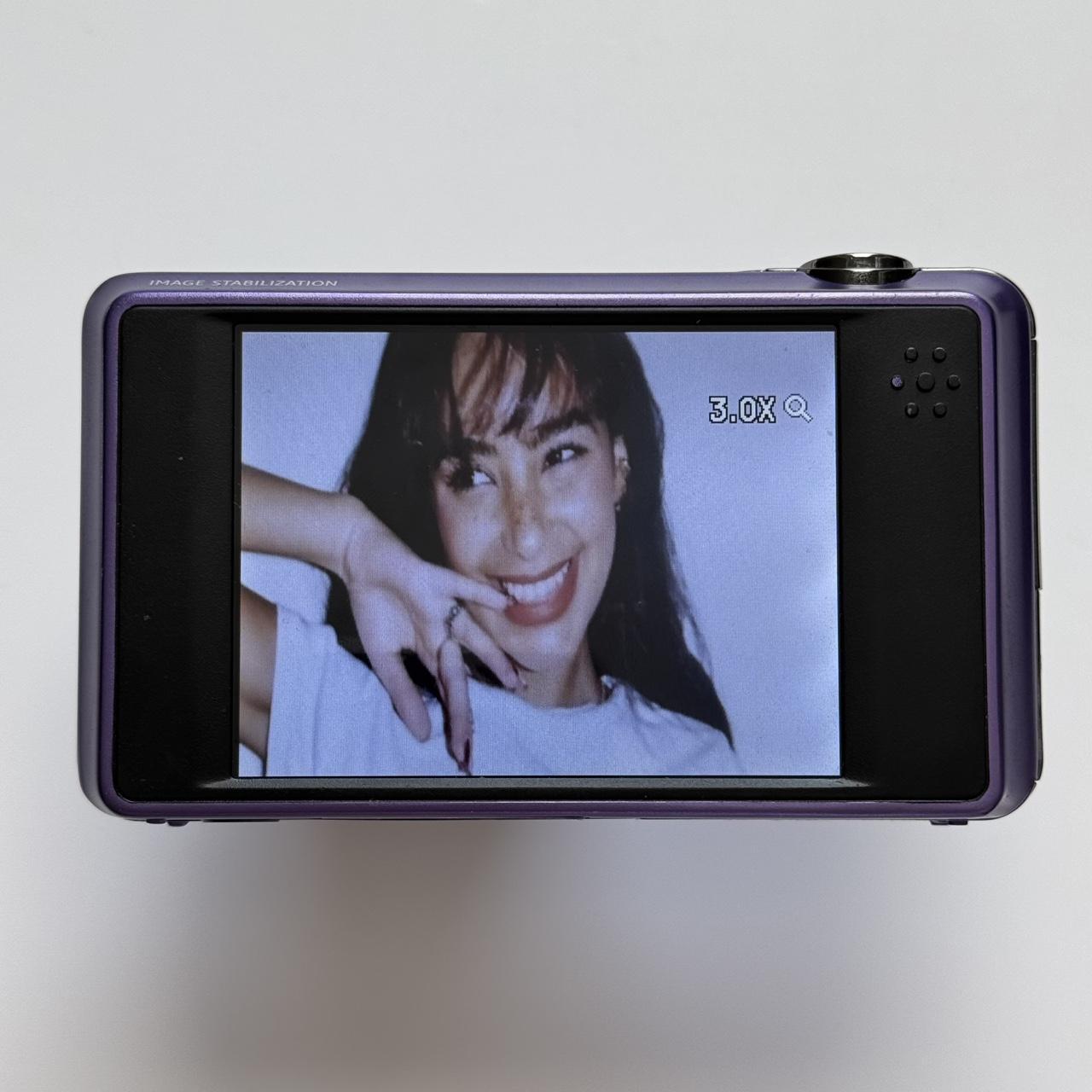 Used E1486TW Purple Digital Camera