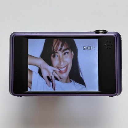 Used E1486TW Purple Digital Camera